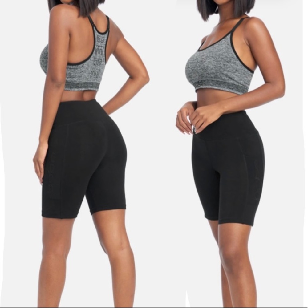 Bebe athletic shorts mesh side pockets elastic waist women’s Size Medium